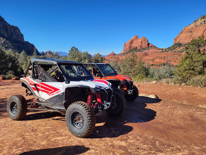 Colorful UTVs navigating rugged trails in the stunning red rock landscape of Sedona, Arizona, with lush greenery and bright blue skies, showcasing family-friendly adventure vibes, emphasizing excitement and exploration in a picturesque outdoor setting.